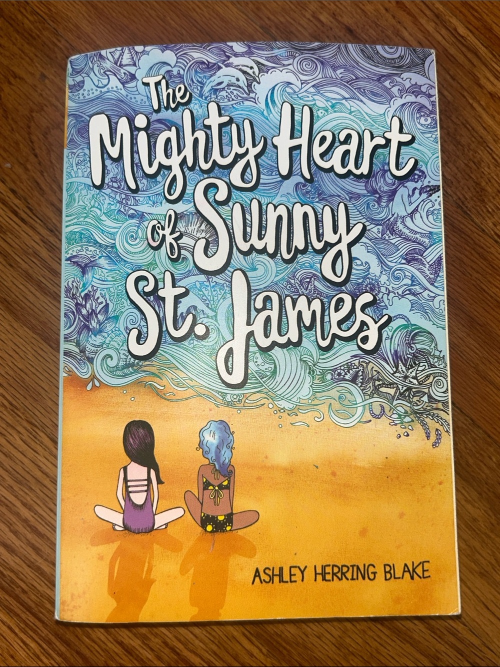 The Mighty Heart of Sunny St. James - Light Blue & Orange Paperback Book